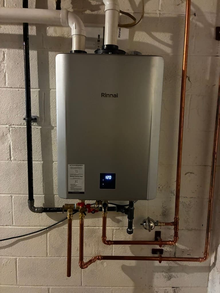 Tankless water heater with copper supply lines installed by MRJ Plumbing in Asheville, NC